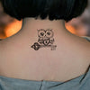 Small ephemeral tattoo (temporary) cute owls with keys, woman